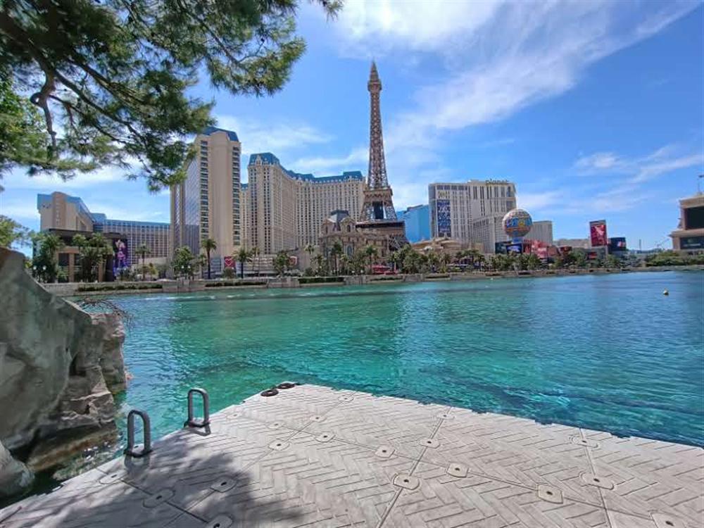 The Bellagio lake with the Eiffel Tower replica across the water