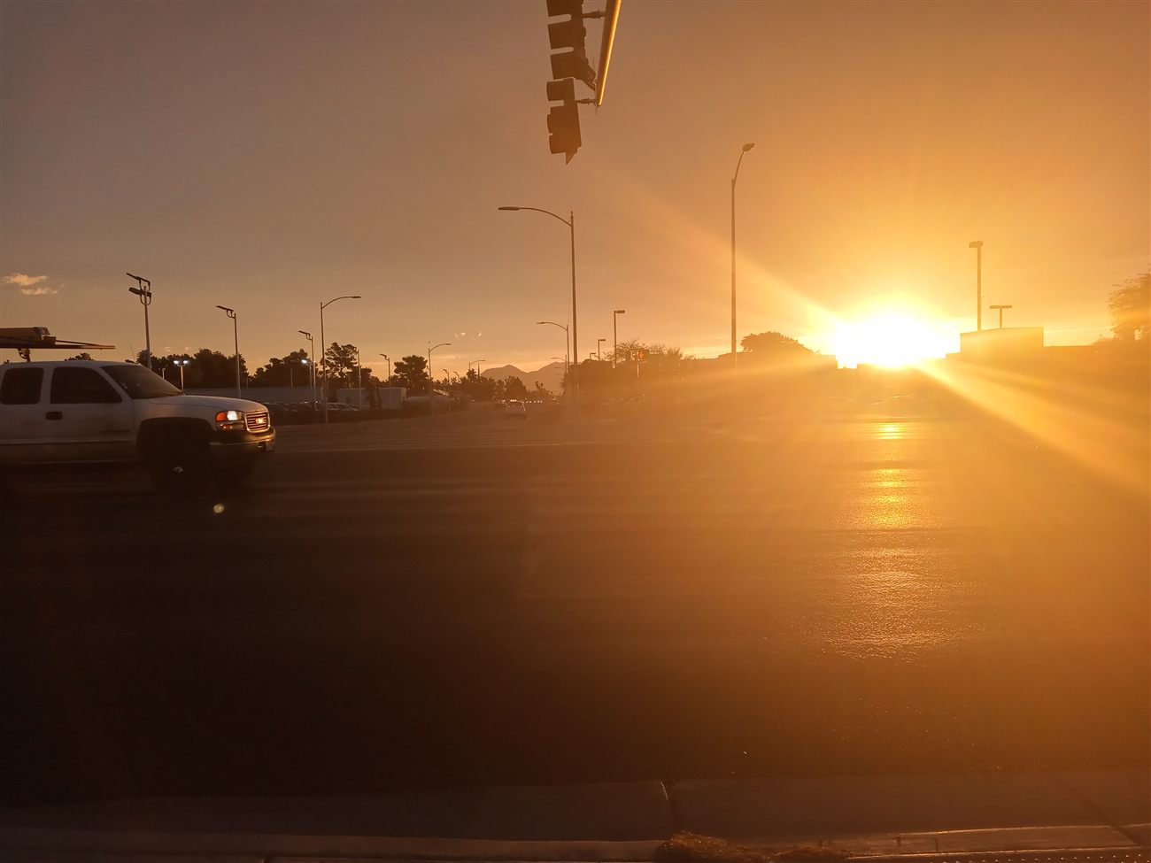 Silhouette of a truck near a school in Las Vegas in the morning light