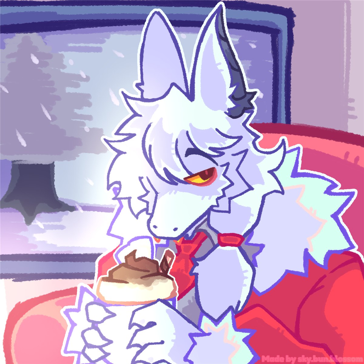 Matroska relaxing on a couch with a drink by a snowy window